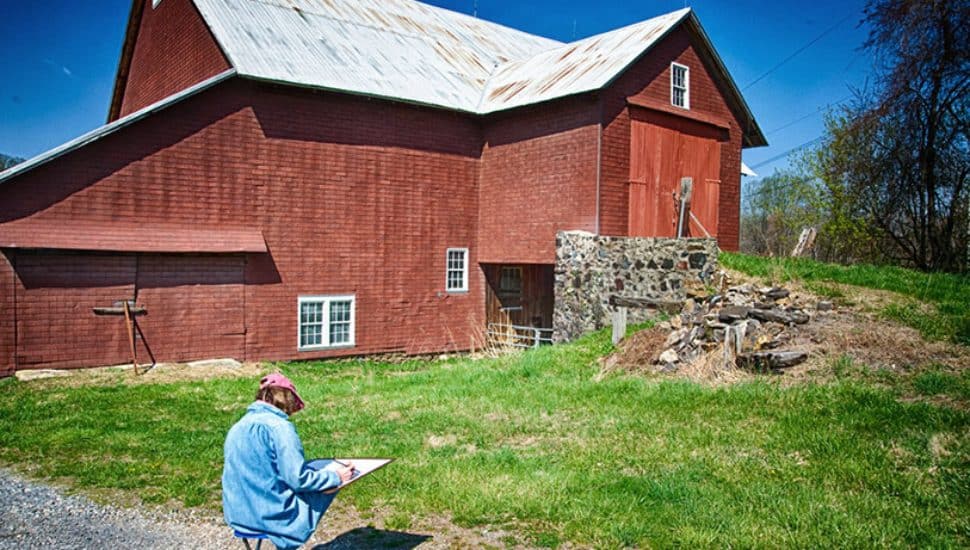 A painting student at Chester County's Kuerner Farm.