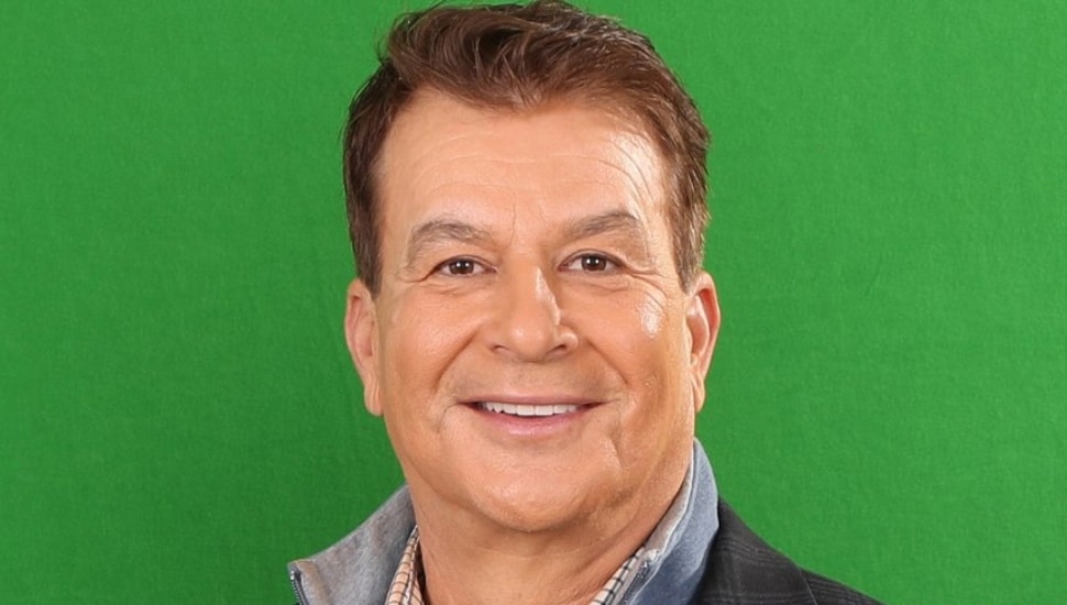 Mike Missanelli with green background.