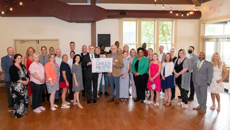 Group photo of nonprofit representatives at award ceremony.