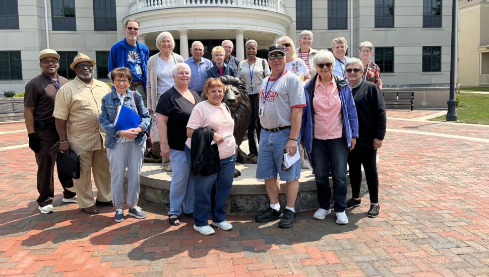Participants in Widener University's Osher Lifelong Learning Institute, or OLLI, pose for a group photo. Widener OLLI OLLI participants gather for a group photo.
