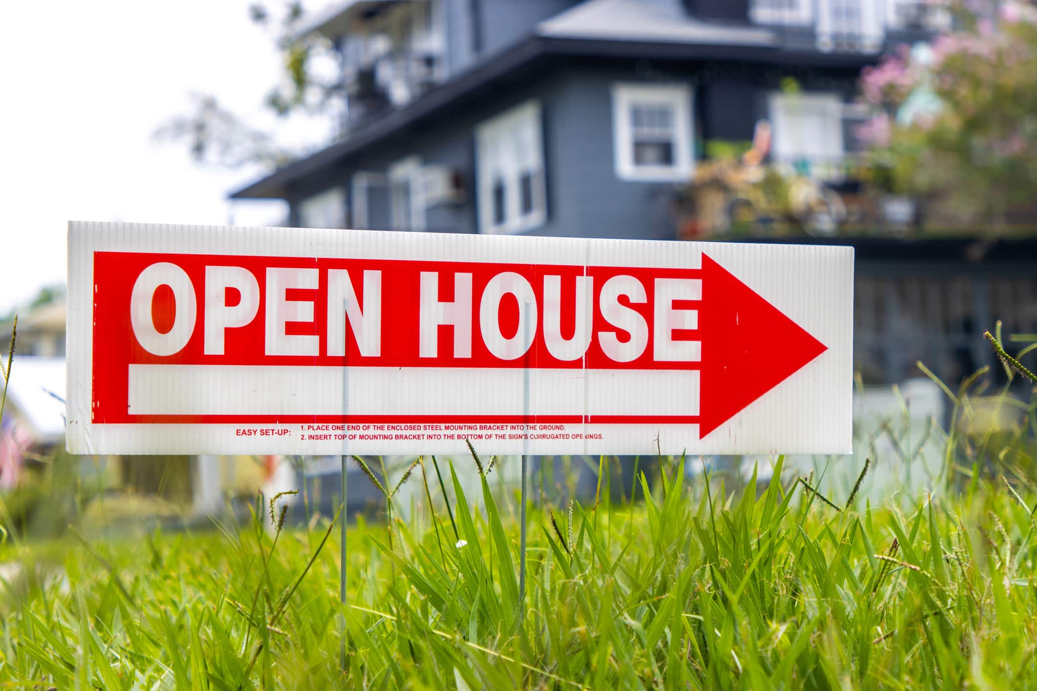 Open House sign on lawn.