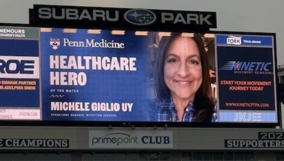 Scoreboard at Subaru Park displaying Michele Giglio Uy as the Penn Medicine Healthcare Hero during a Philadelphia Union game.
