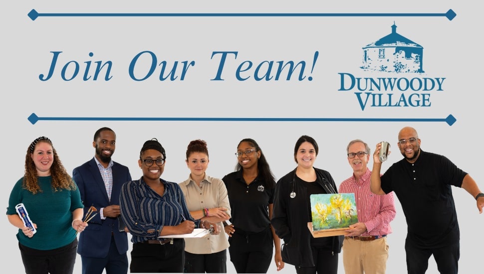 Dunwoody Village employees line up under a "Join Our Team!" logo. Dunwoody-Village-job-fair.