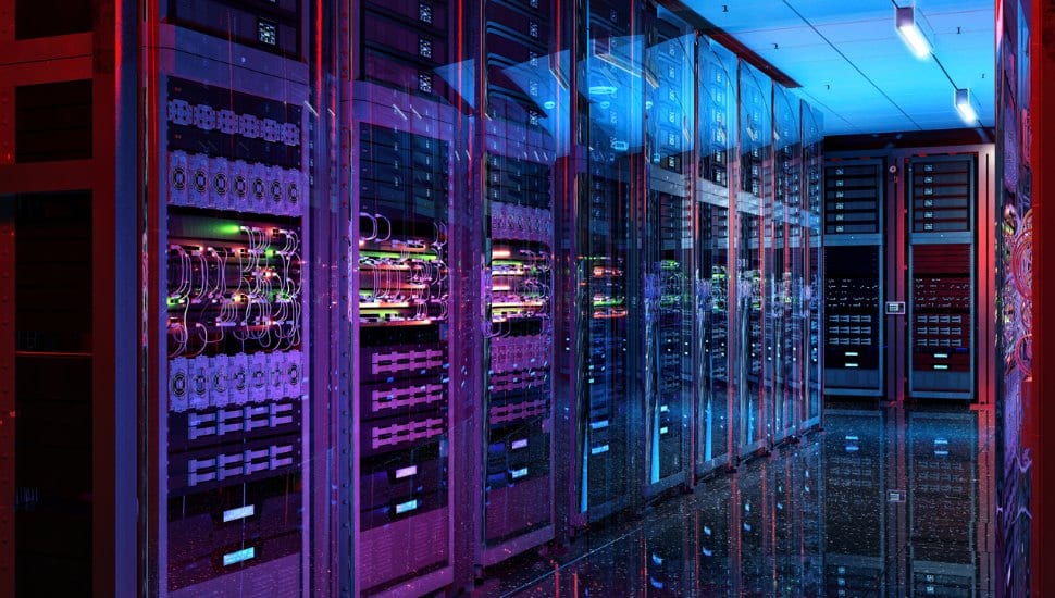 The interior rows of computers at a data center.