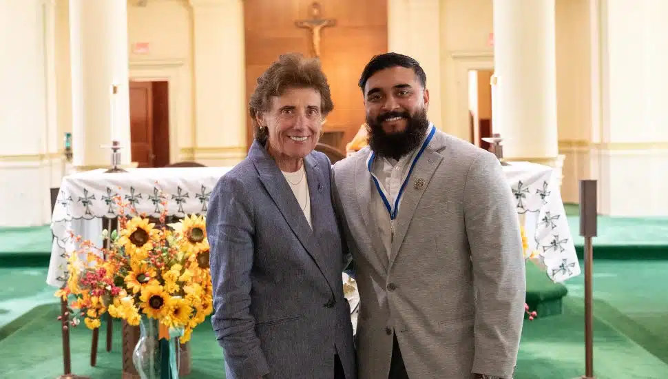 Immaculata University President Barbara Lettiere ’72 with Umair Ahmed ’26, the 2025 recipient of the Saint Catherine Medal.