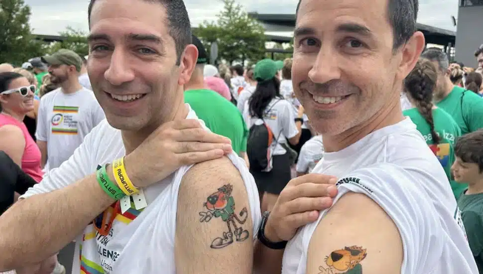 Michael Kazanjian and friend with their tattoos on bicep.