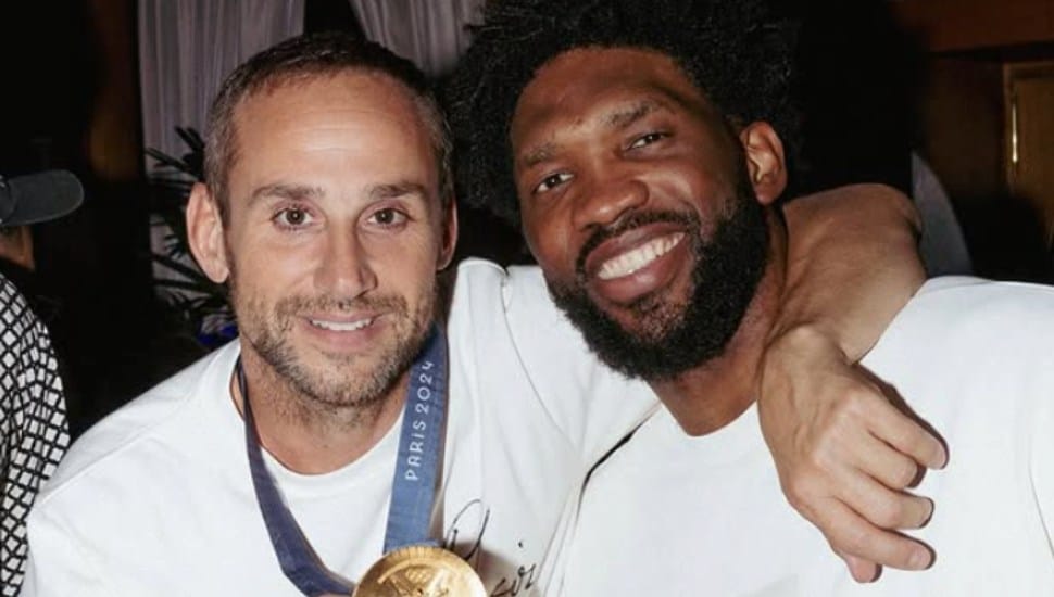 Bryn Mawr native Michael Rubin with Embiid.