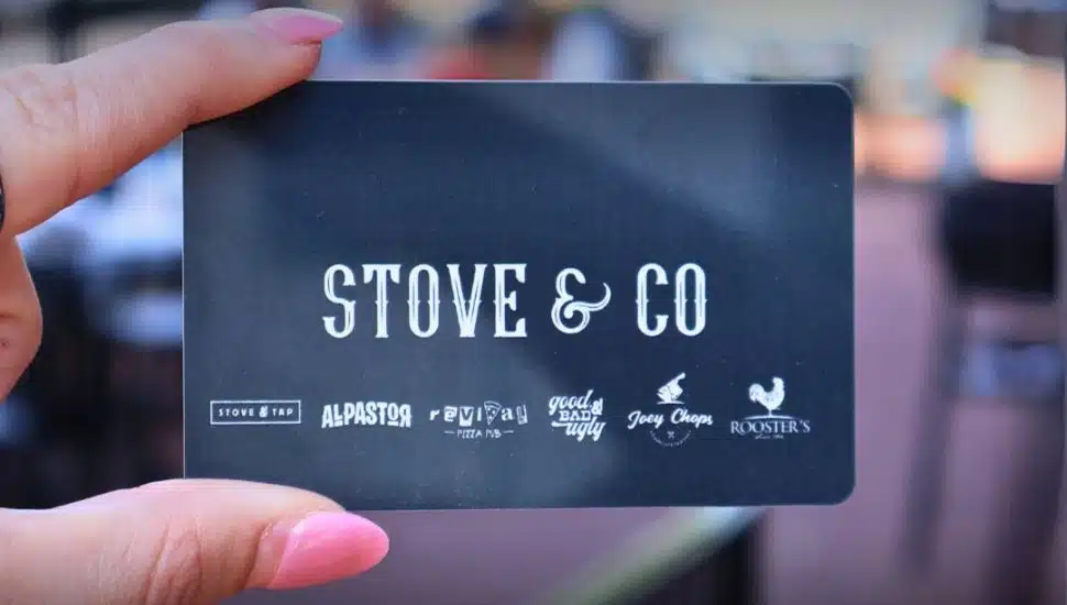 A black Stove & Co gift card.