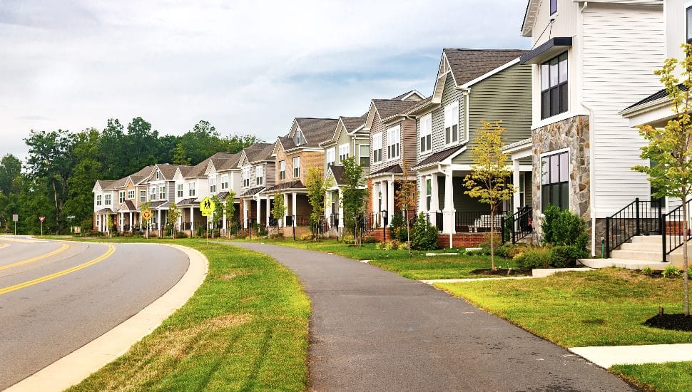 A row of townhomes along a residential street.
