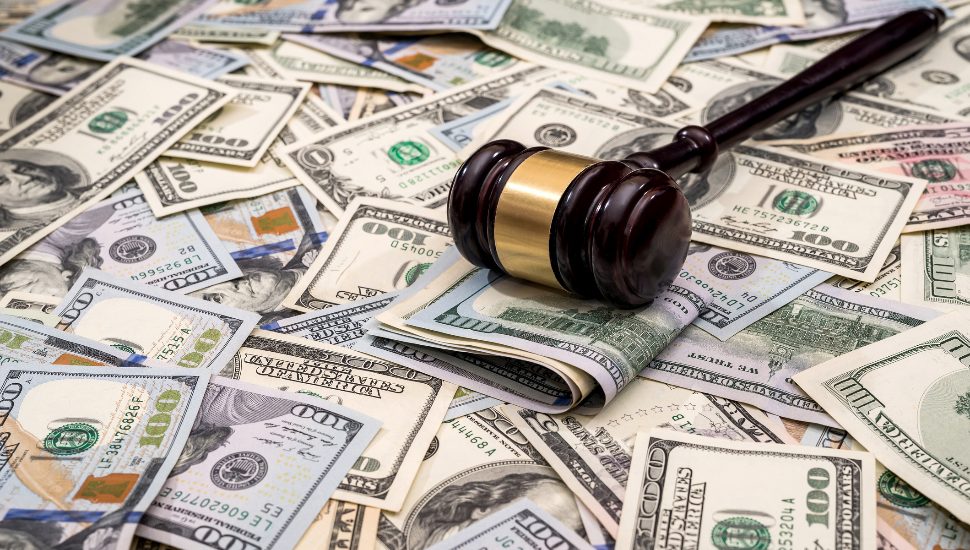 Dollars and a gavel.
