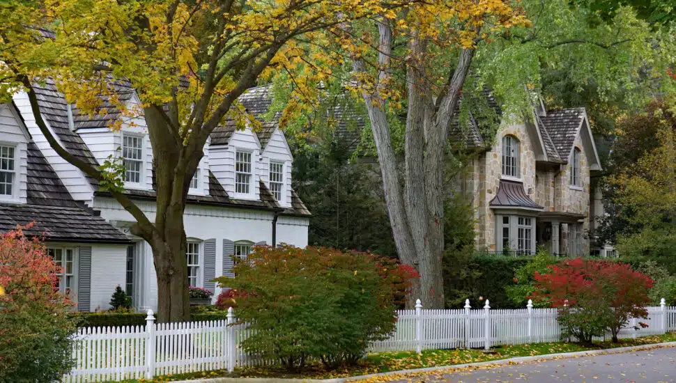 Residential street with nice homes in fall.