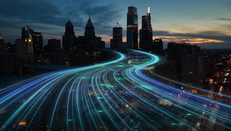 Technology with waves of electricity going into a city.