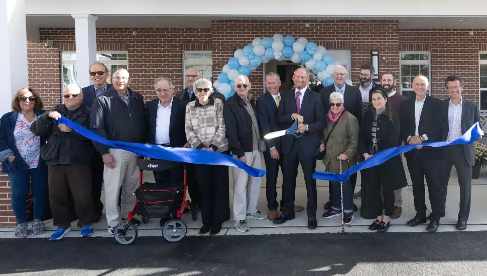 Ribbon cutting at new senior living community.