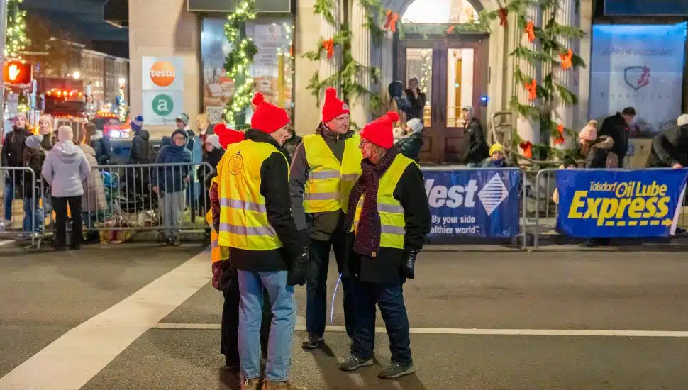 GWCC parade volunteers in the street.
