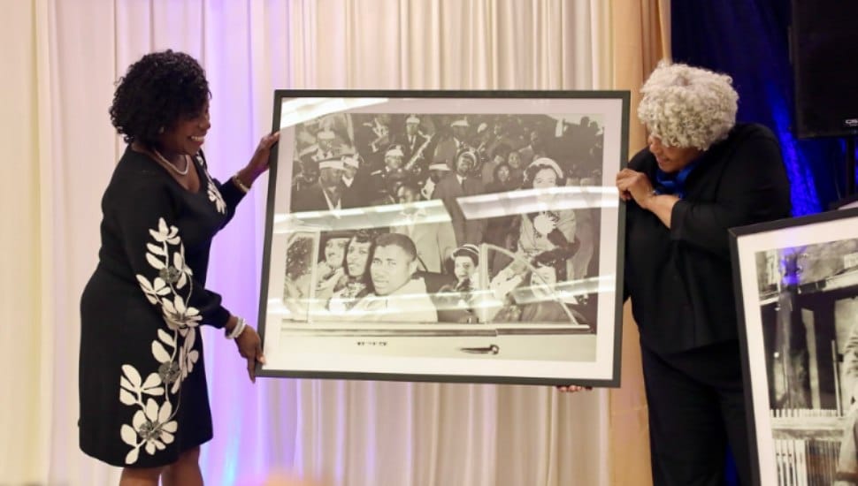 Philadelphia mayor Cherelle Parker presenting a commemorative item at The Lincolnian's 100th anniversary event.