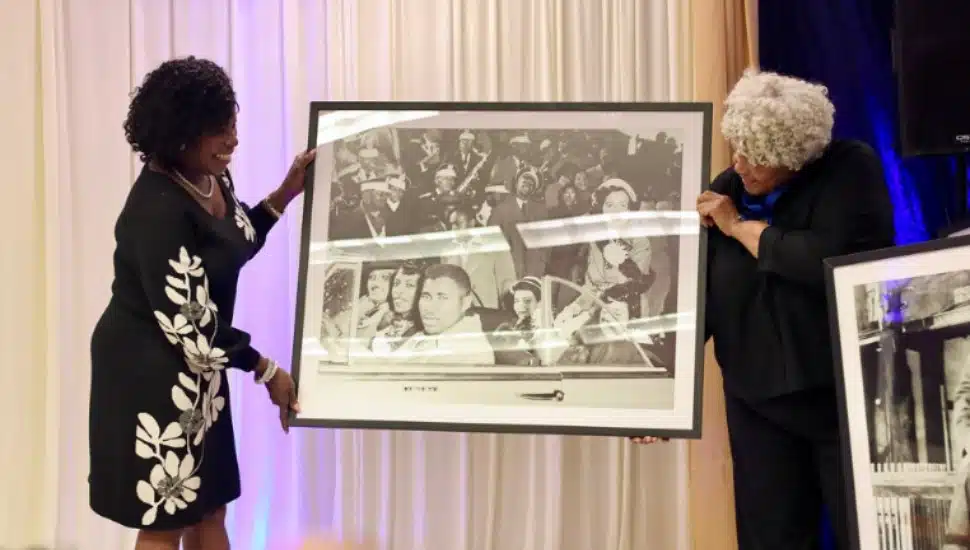 Philadelphia mayor Cherelle Parker presenting a commemorative item at The Lincolnian's 100th anniversary event.