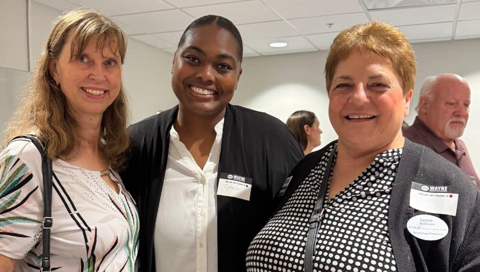 Jana Bovanova, Renata Boodhansingh, and Lynne Williams networking