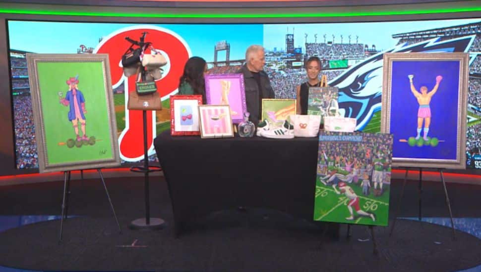 Callie Avellino on FOX29 with anchors and her art pieces.