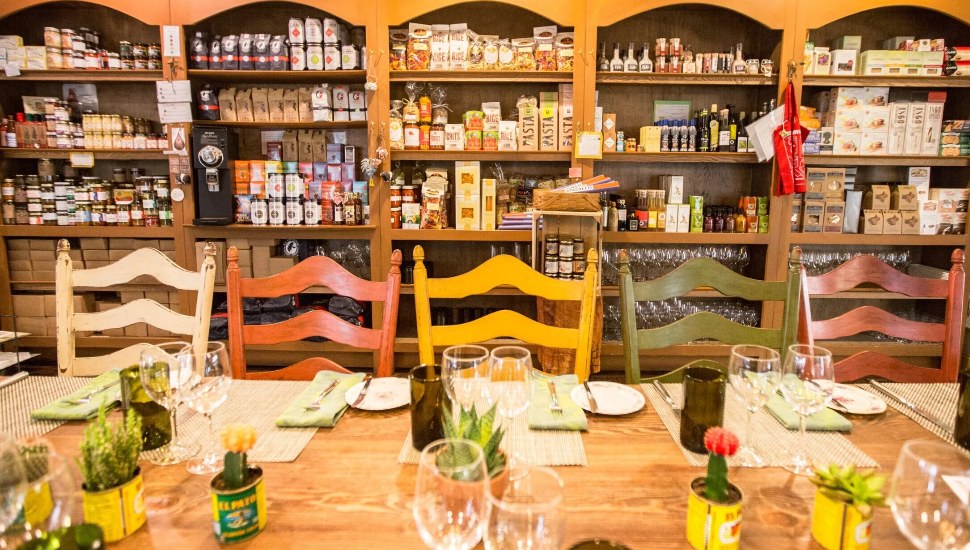 Interior seating and wall market items at Talula's Table in Kennett Square.