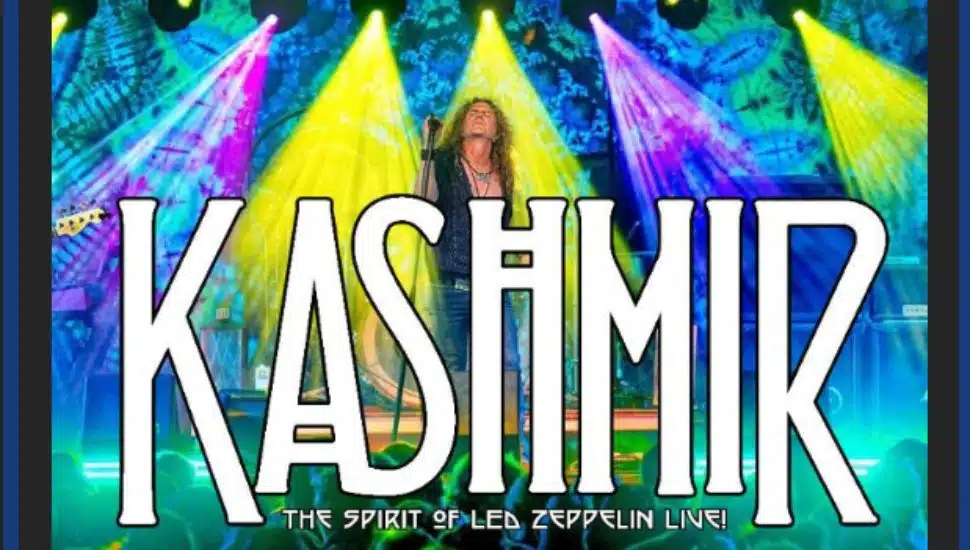 KASHMIR performs live on stage under vibrant lights at Uptown! West Chester, part of the Chester County OIC Artful Impact benefit concert celebrating the spirit of Led Zeppelin.