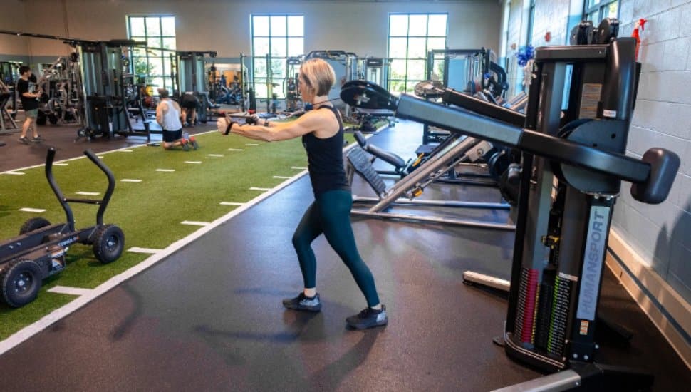 A YGBW staff member demonstrates new strength equipment at the Jennersville YMCA located in West Grove, PA. 