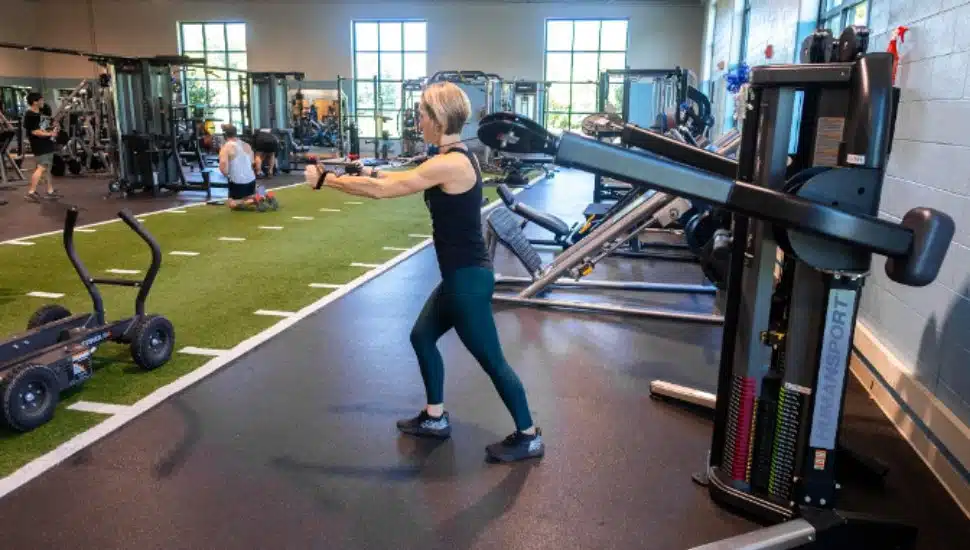 A YGBW staff member demonstrates new strength equipment at the Jennersville YMCA located in West Grove, PA.