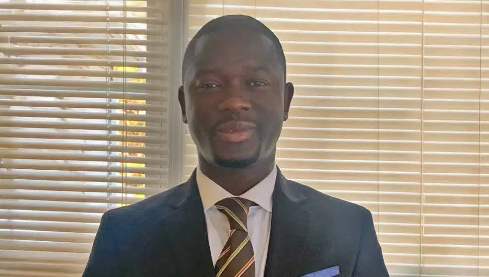 Portrait of Dr. Foday Kamara, a Wilmington University alumnus and doctorate recipient in Prevention Science, who is launching a nonprofit to support women’s human-rights and well-being globally.