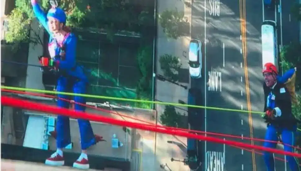 Malvern resident Natanya Sortland rappeling down the side of a thirty-story Philadelphia building.