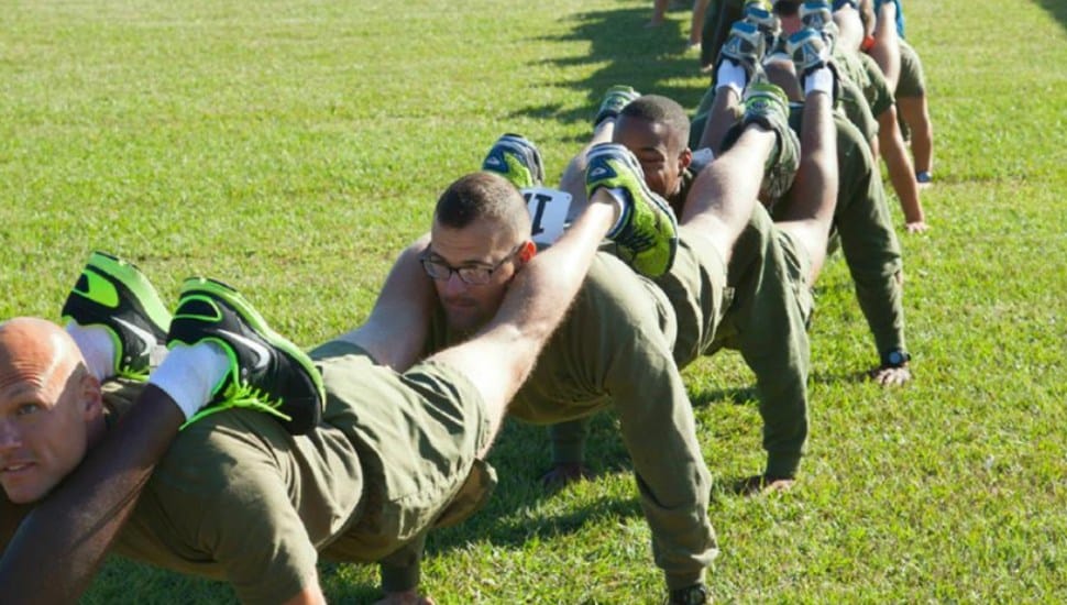 A group of participants accomplishing the world's longest chain push-up in September 2013.