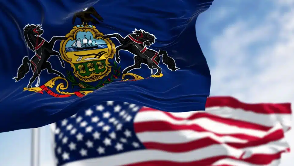 PA state flag and American flag.