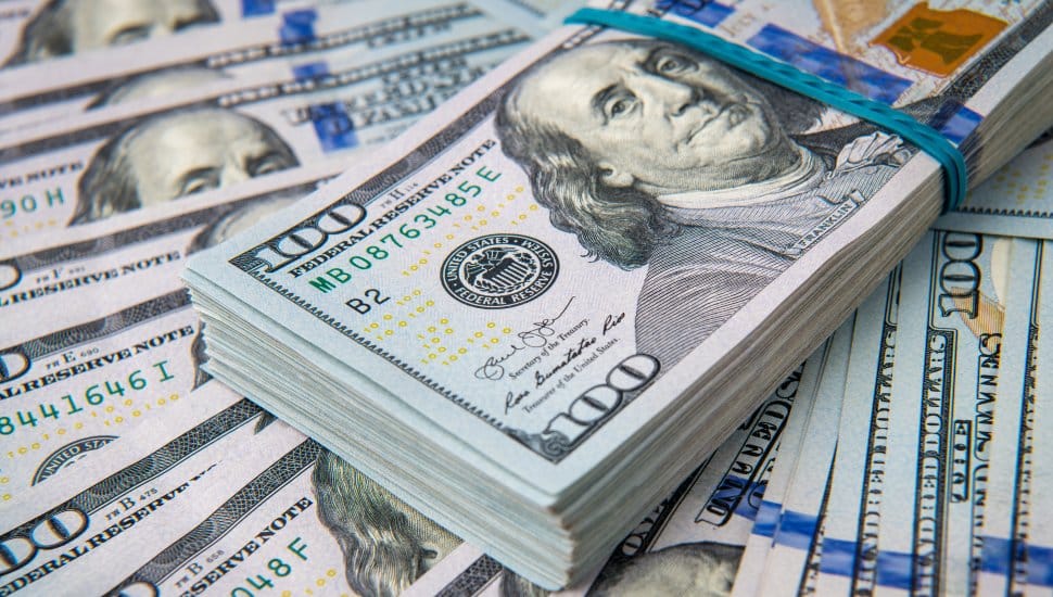 Stack of one hundred dollar bills.