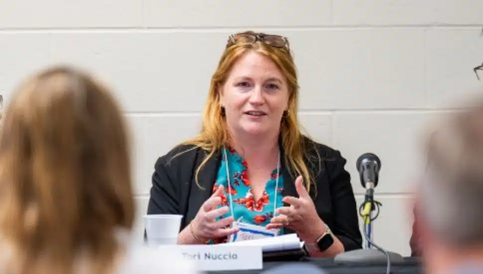 Portrait or feature image of Dr. Tori Nuccio, West Chester University’s deputy director of financial aid, who received PASSHE’s Keepers of the Flame Award for her leadership in equity, access, and student support.
