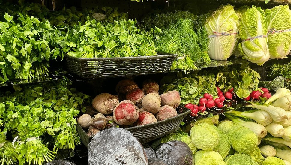 Fresh produce on shelves.