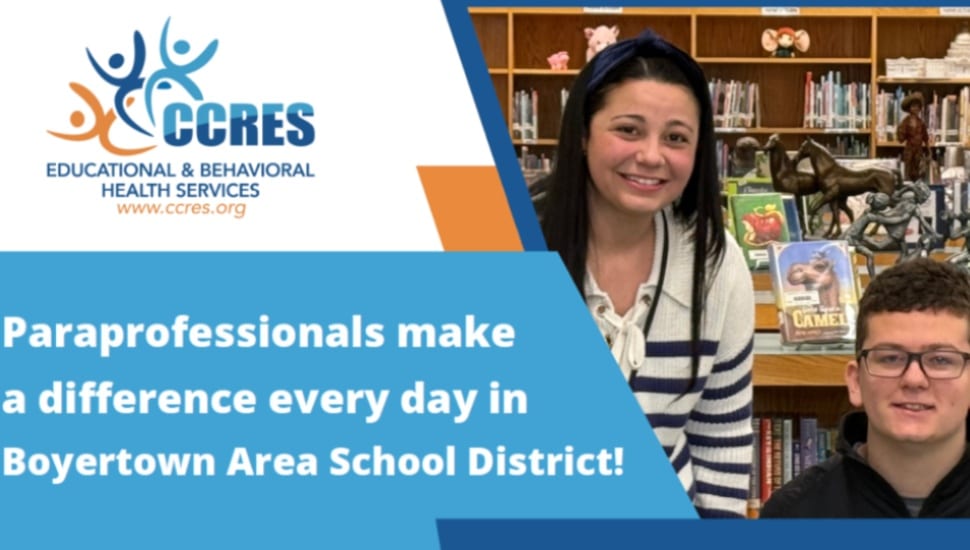 A poster promoting Paraprofessionals in the Boyertown Area School District showing a staff member and a student in a room with bookshelves behind them.