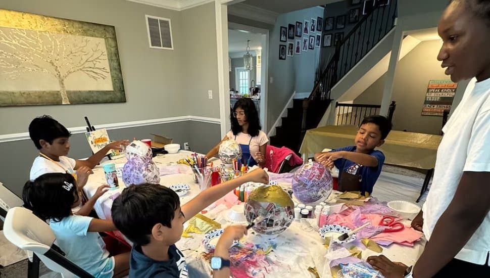 Malvern teen Faridah Ismaila leading a youth art class.