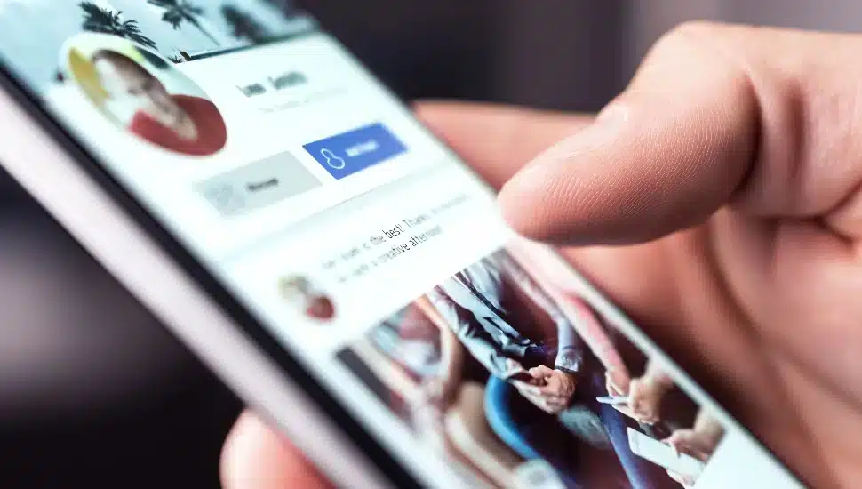 Man using LinkedIn on his phone