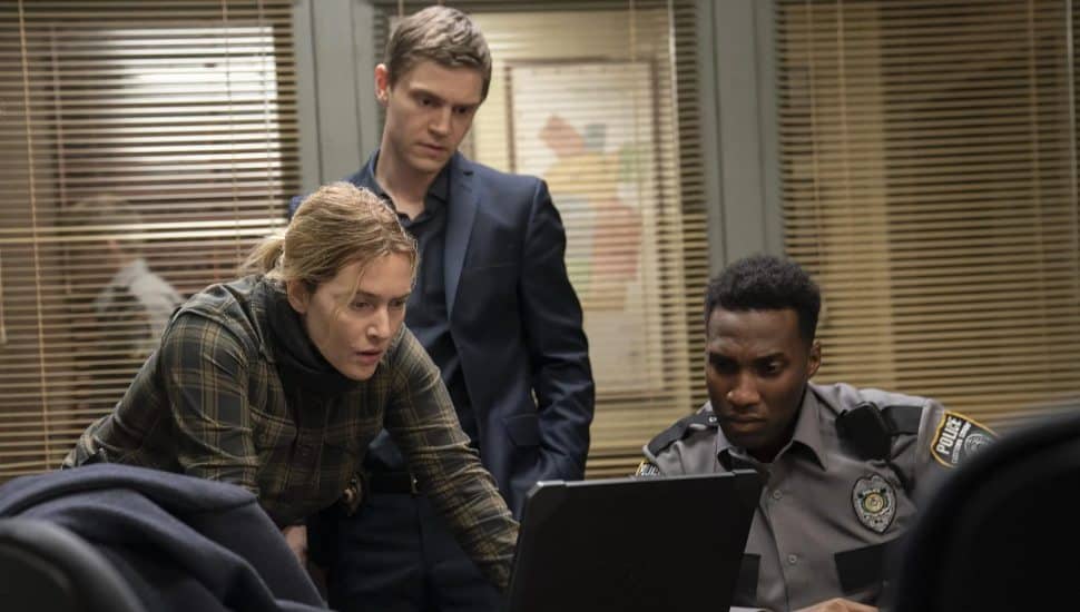 Kate Winslet, Evan Peters, and Justin Hurtt-Dunkley in HBO's 'Mare of Easttown.'