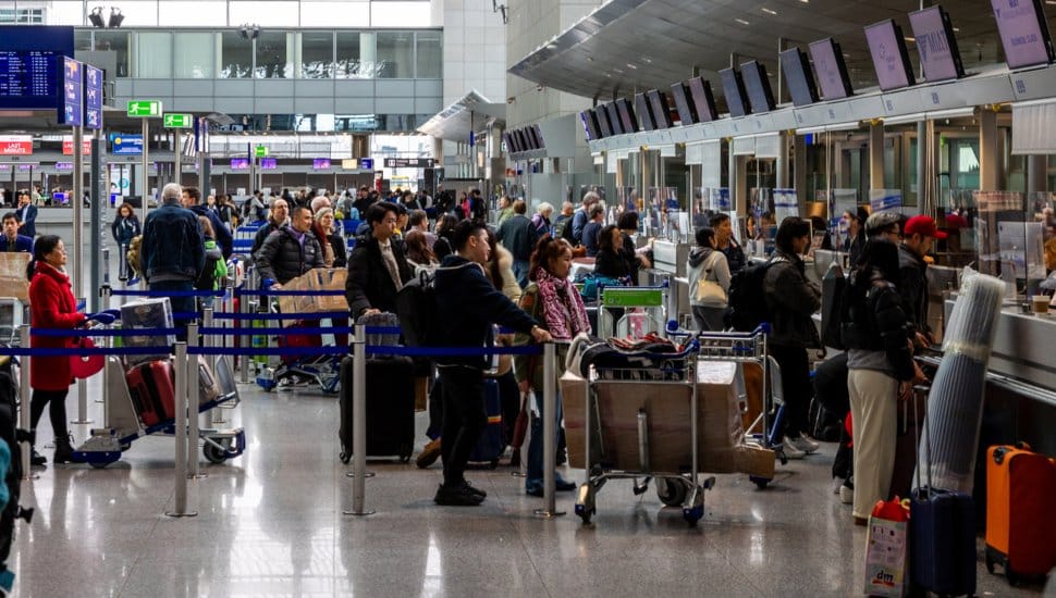 Crowd of people in airport.