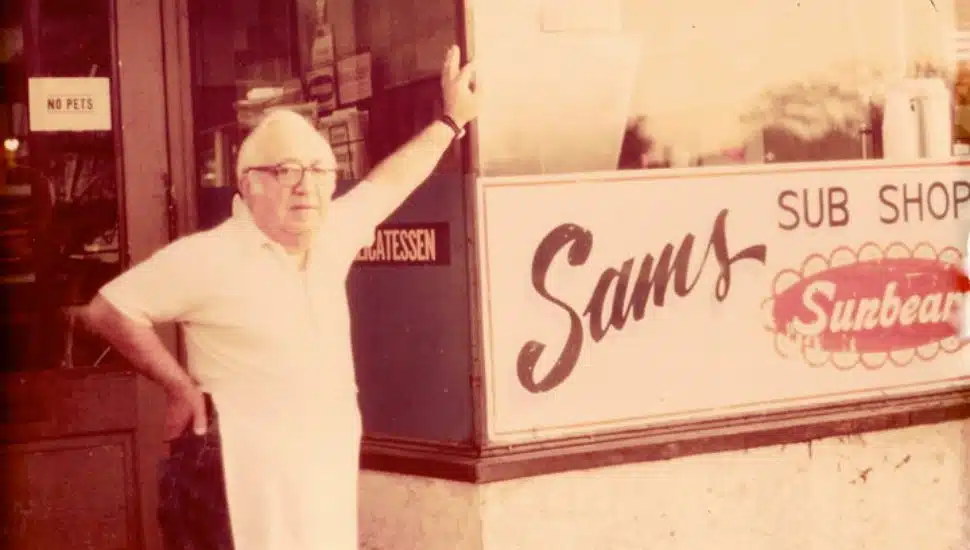 Founder Sam Frabriso in front of Sam's Sub Shop.