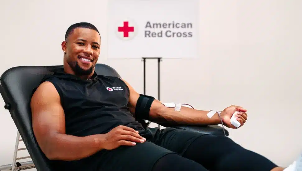Saquon Barkley donating blood.