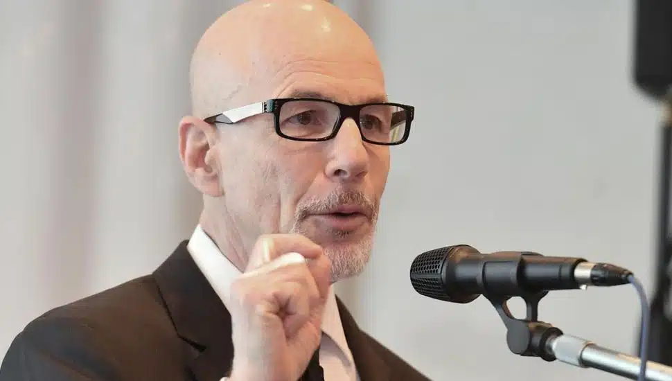 Stephen Klasko speaking into a microphone.