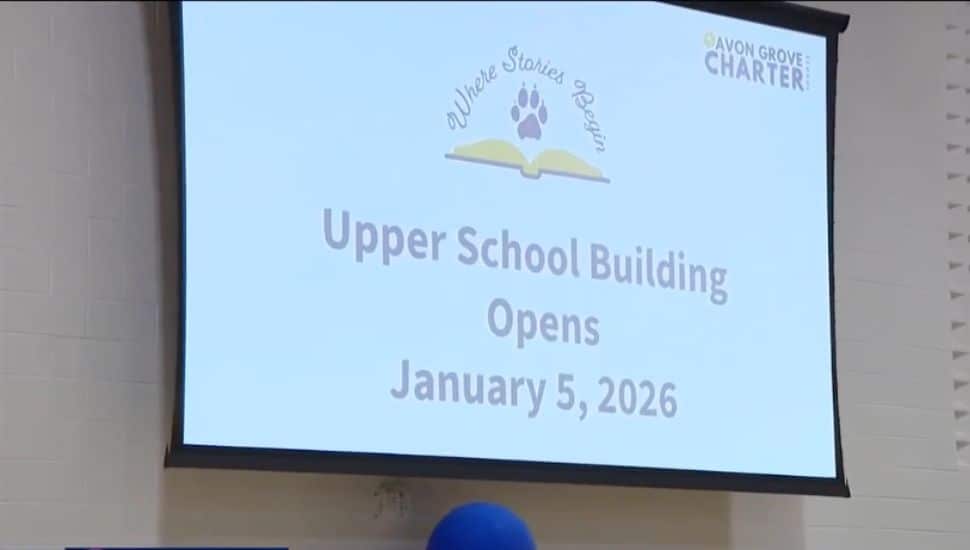 Avon Grove Upper Building announcement on a projector.