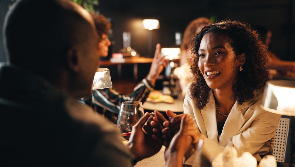 A couple enjoying a romantic dinner.