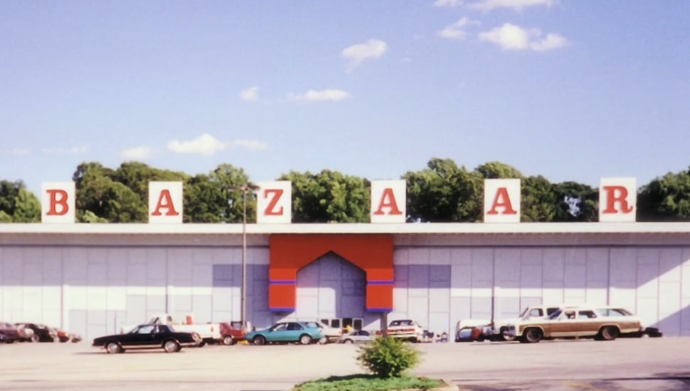 The storefront and parking lot of the Bazaar of All Nations that straddles Upper Darby and Clifton Heights.