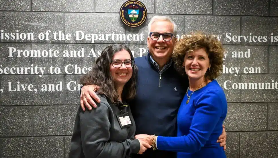 Chester County 911 operator Kayla Wettlaufer with caller Terri Borzillo and her husband Robert.