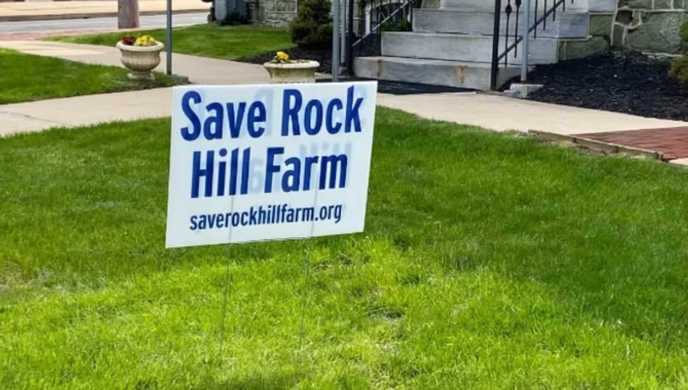 A Save Rock Hill Farm protest lawn sign.
