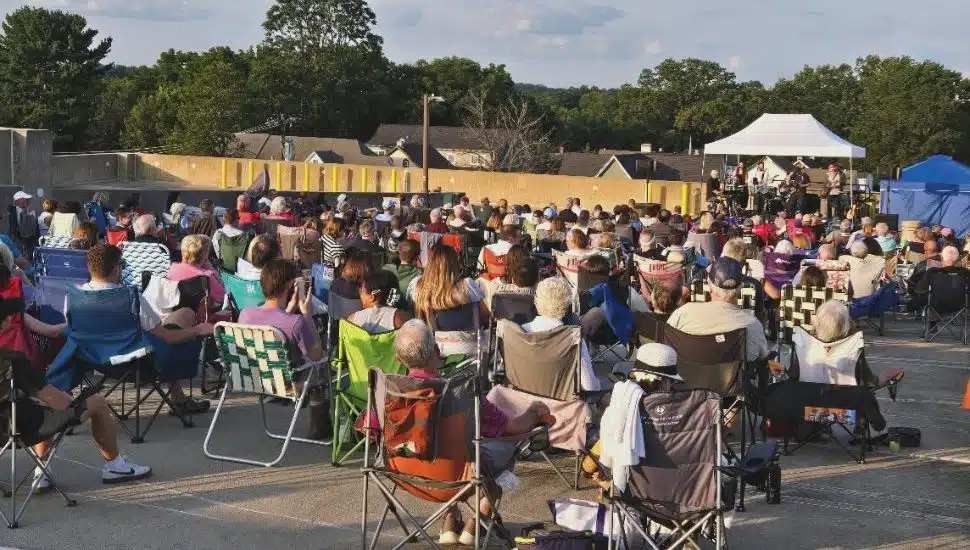 People listening to music at Kennett Flash.