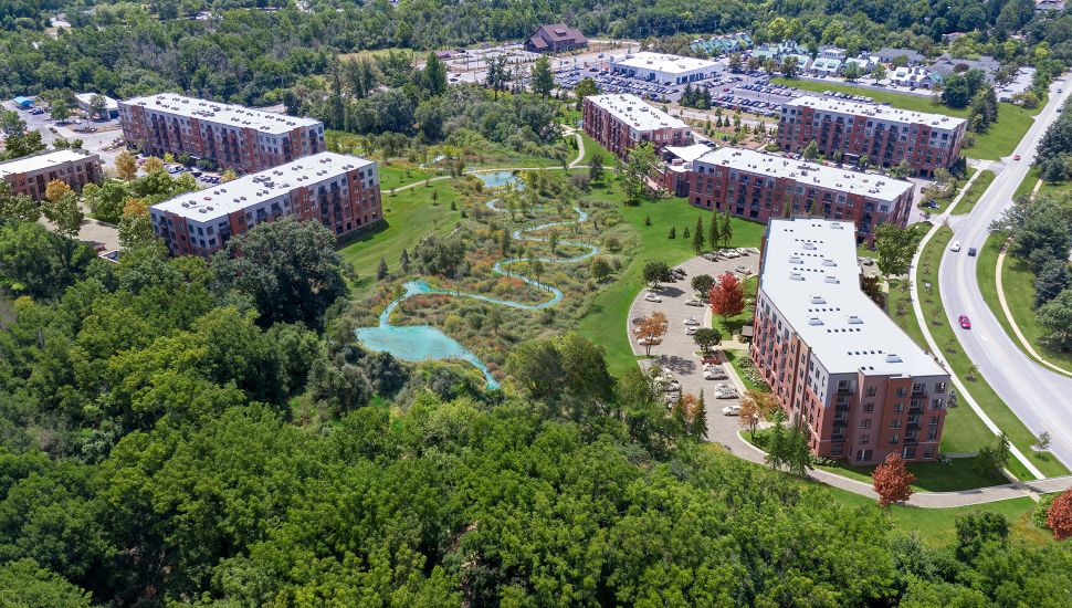 ariel view of Keva Flats next to a waterway.