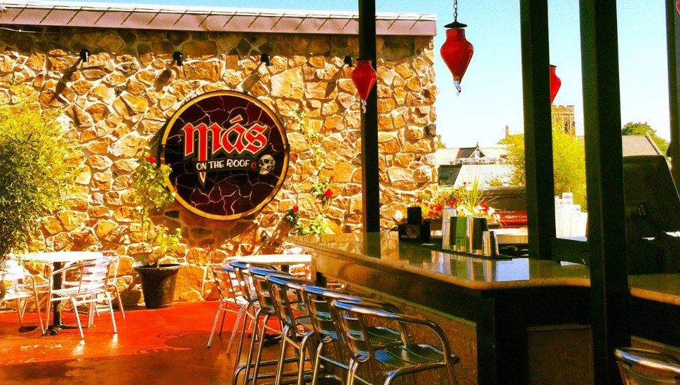 Outdoor bar seating at Mas Mexicali Cantina.