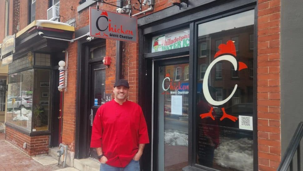 Restaurateur Carlos Vargas in front of his new restaurant, West Chester Chicken.